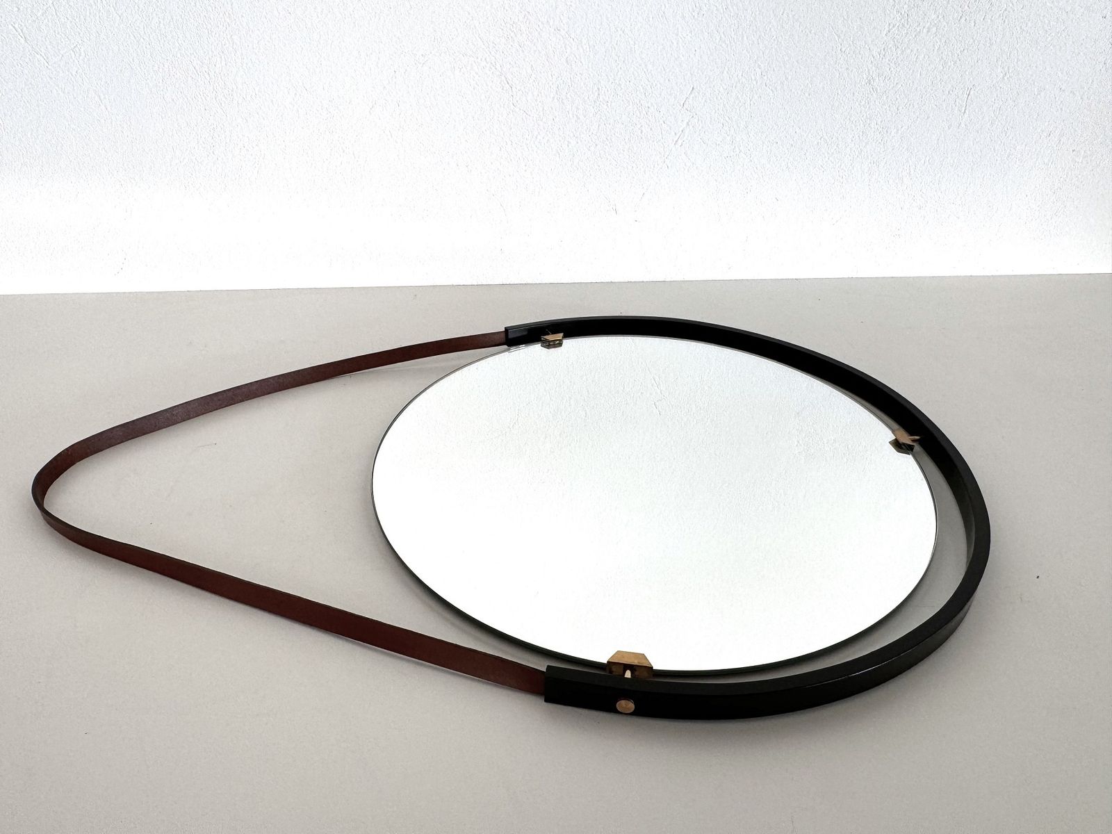 880.0 Italian Floating Wall Mirror With Leather Strap And Brass Details, 1960s photo