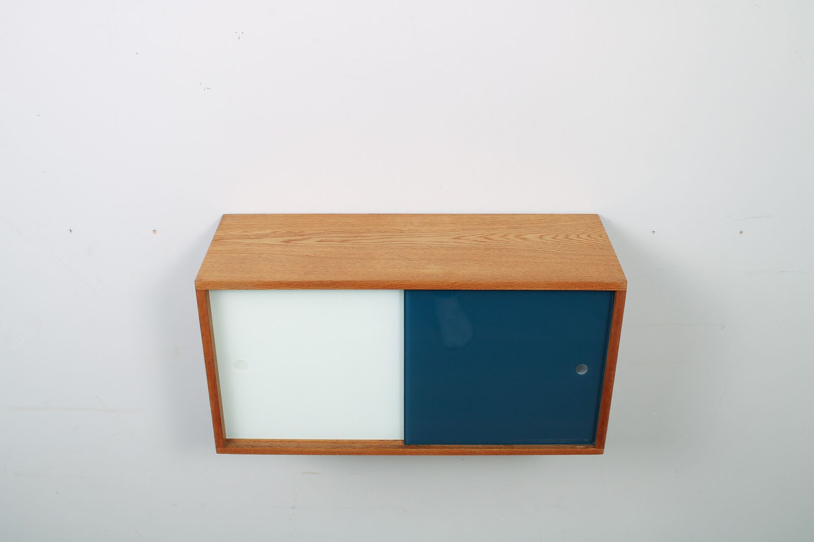 A Vintage Mid Century Wall Hung Oak Cabinet, Blue & White Sliding Glass Doors photo vintage
