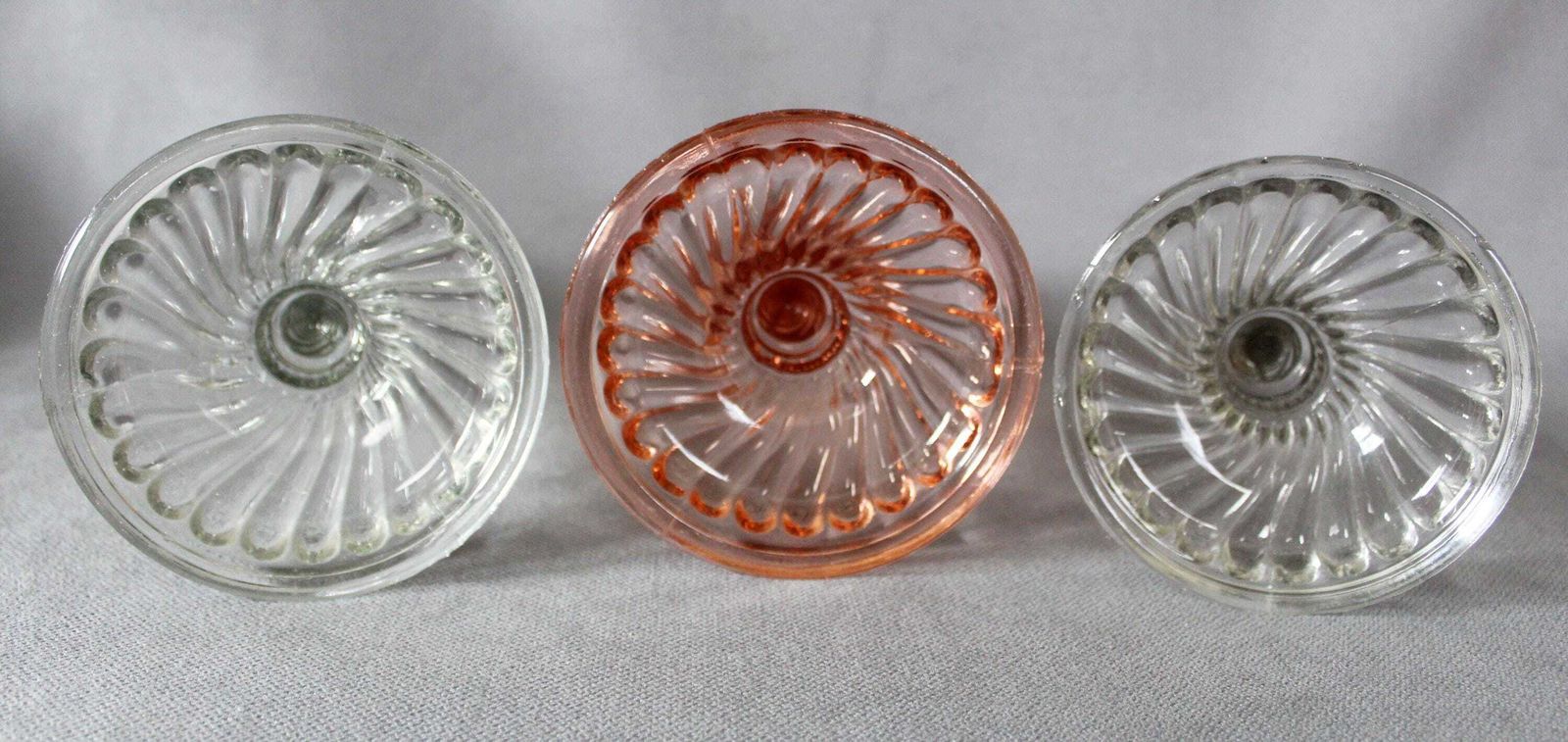 photo for sale Three Art Deco Pressed Glass Candlestick Holder, Clear And Pink Rosaline Candle Holder, Scailmont Or Durover Belgium, Twisted Design