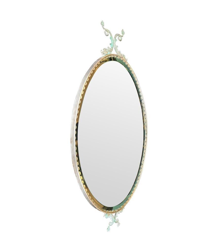 photo for sale A Pair Of Italian 1940s Oval Mirrors With Dolphin Detailing Around The Brass Frame