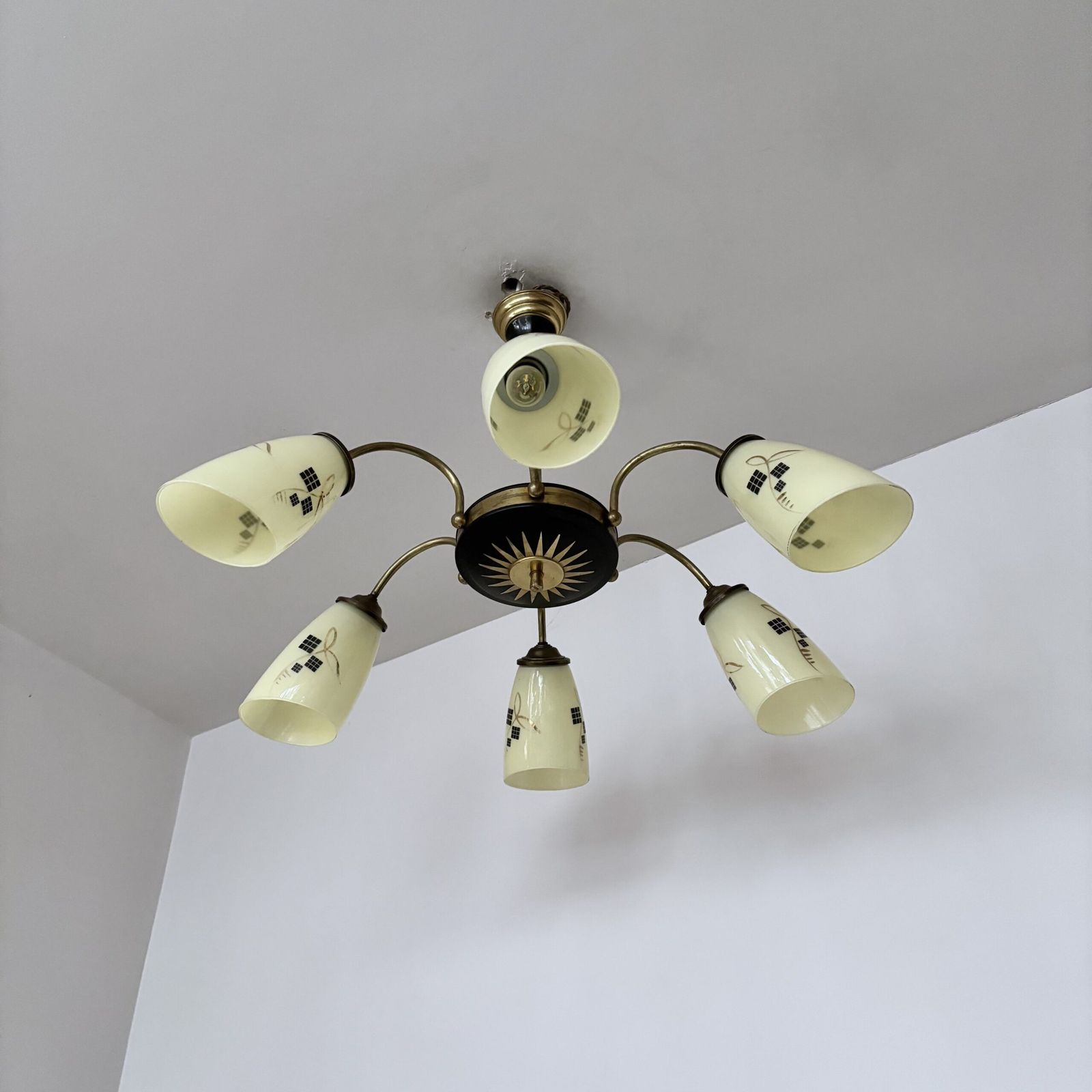Mid Century Brass And Black Chandelier With Decorative Yellow Glass Shades photo for sale