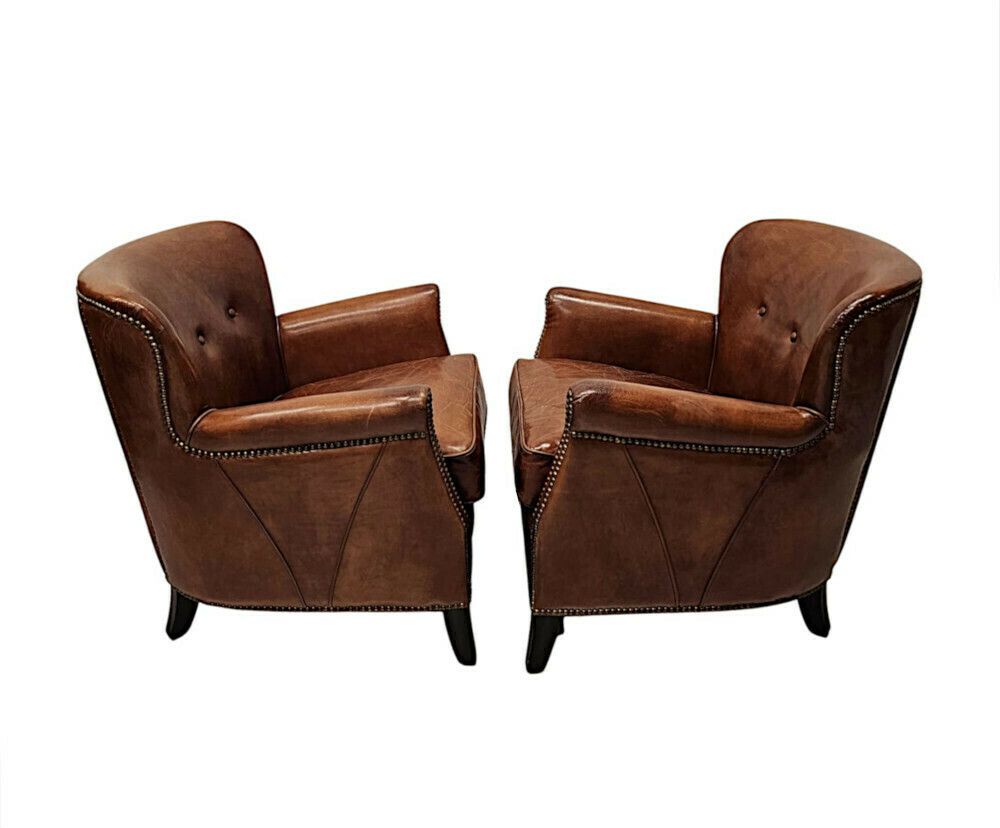 A Stunning Pair Of Small Leather Club Armchairs In The Art Deco Style photo furniture