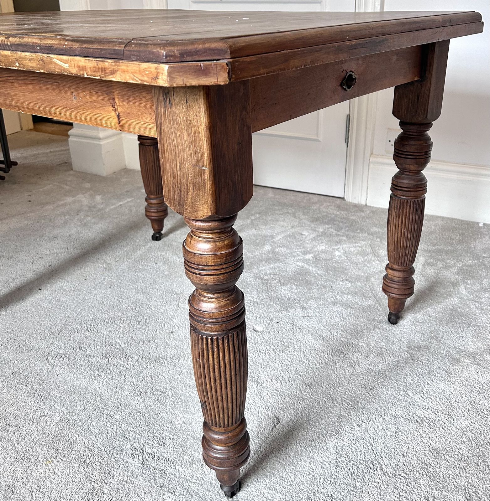 Victorian Farmhouse Table. Dark Stained Carved Wood. Original Castor Wheels photo vintage