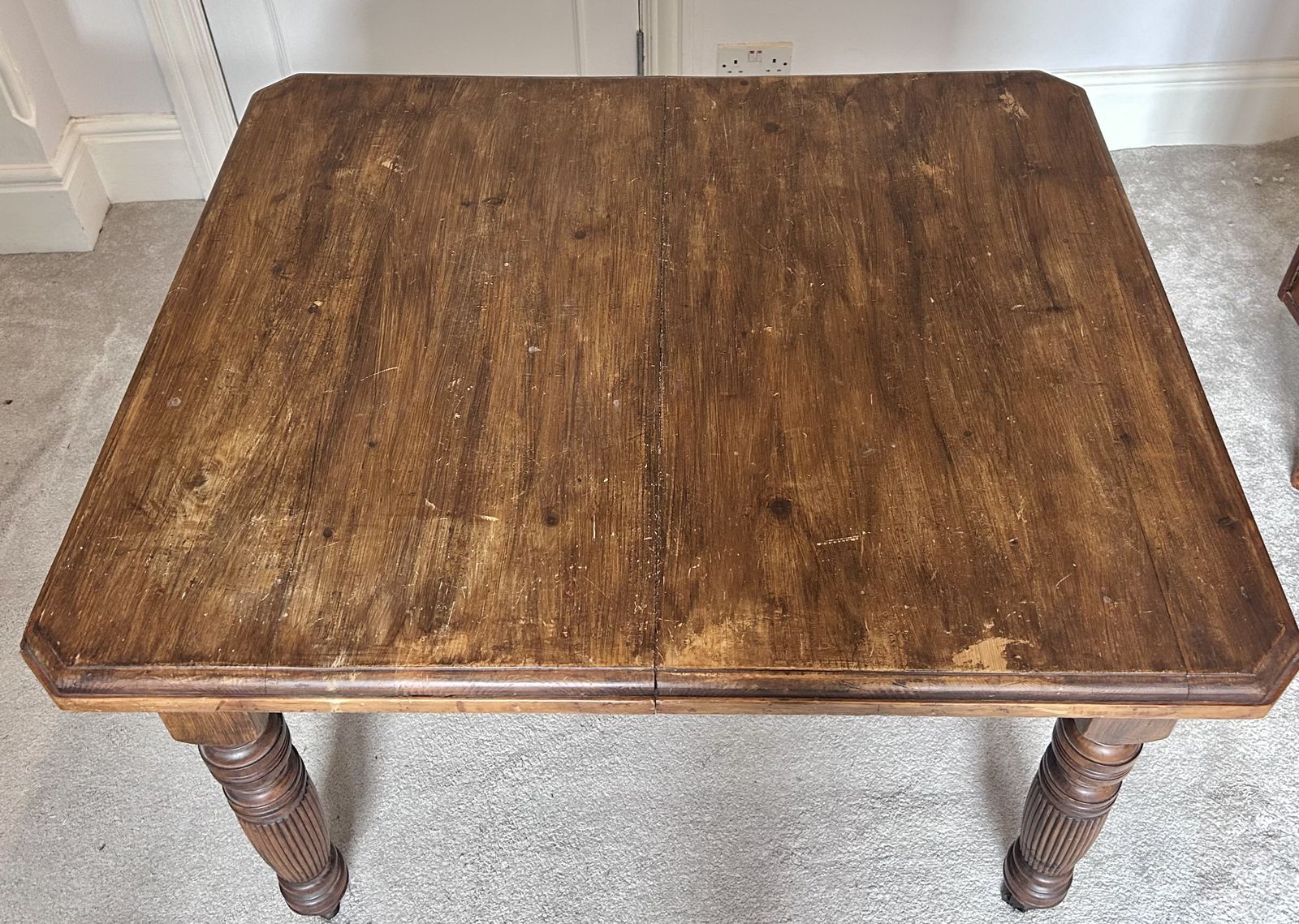 photo furniture Victorian Farmhouse Table. Dark Stained Carved Wood. Original Castor Wheels