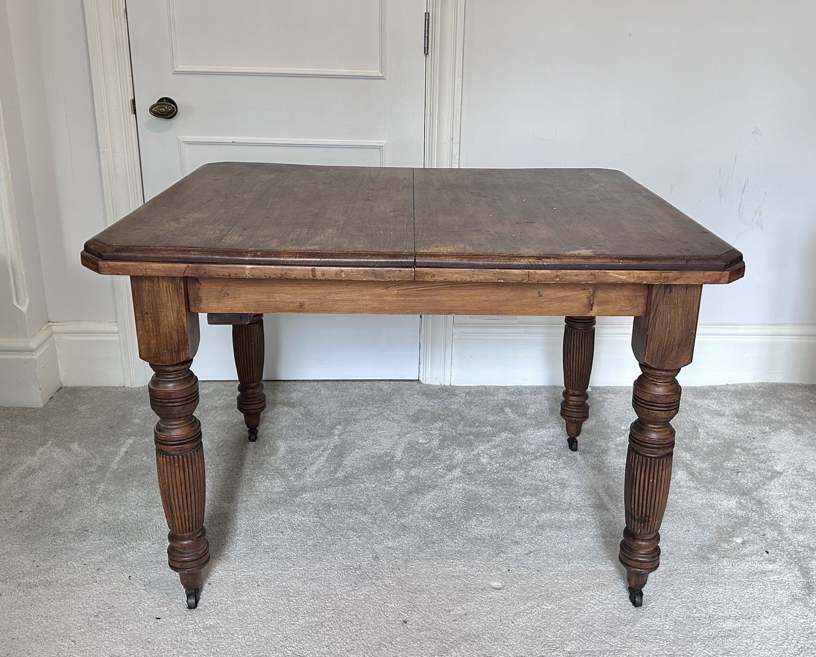 Victorian Farmhouse Table. Dark Stained Carved Wood. Original Castor Wheels photo furniture