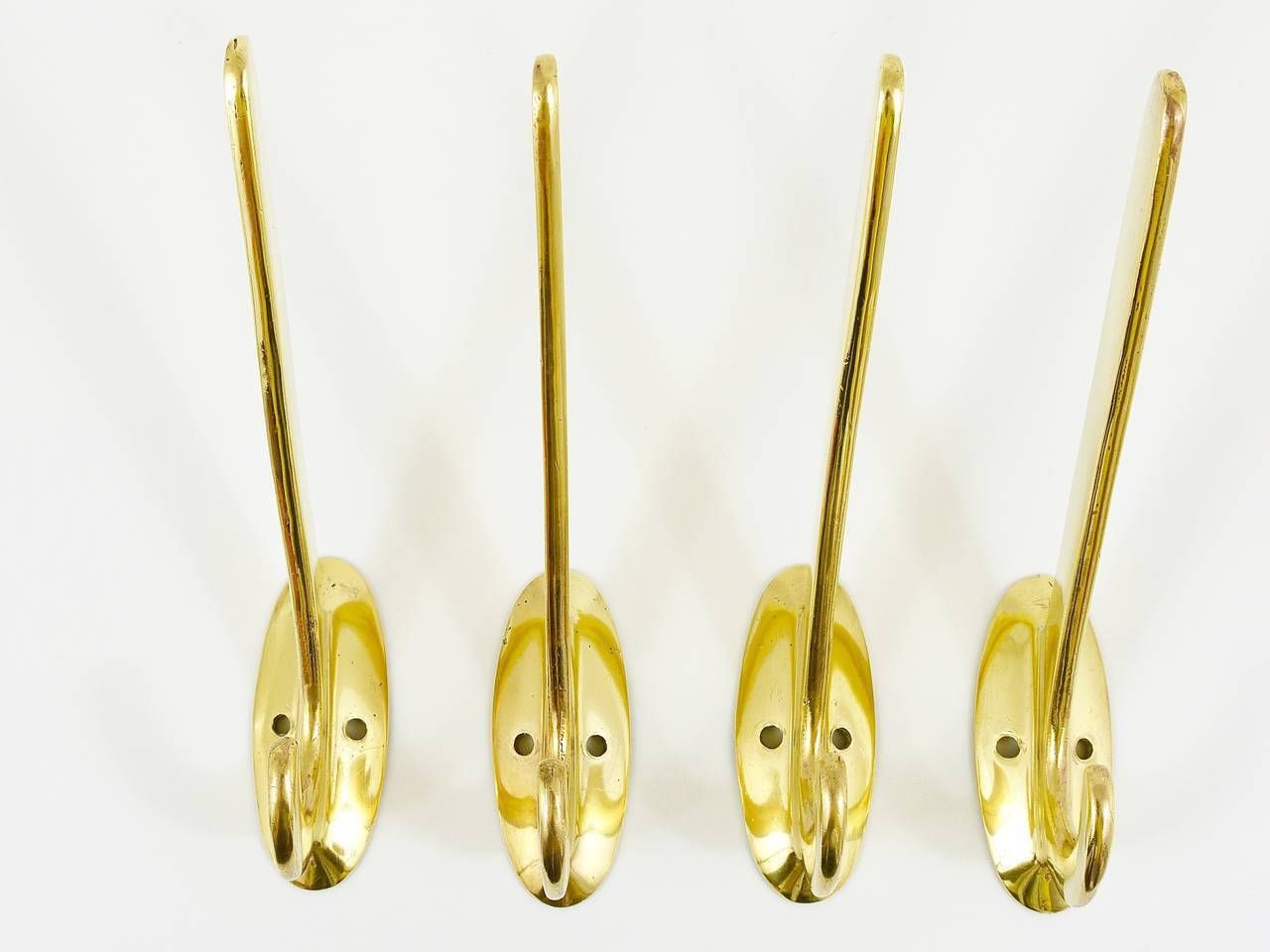 Four Art Nouveau Handmade Brass Wall Hooks, Austria, 1920s photo Art