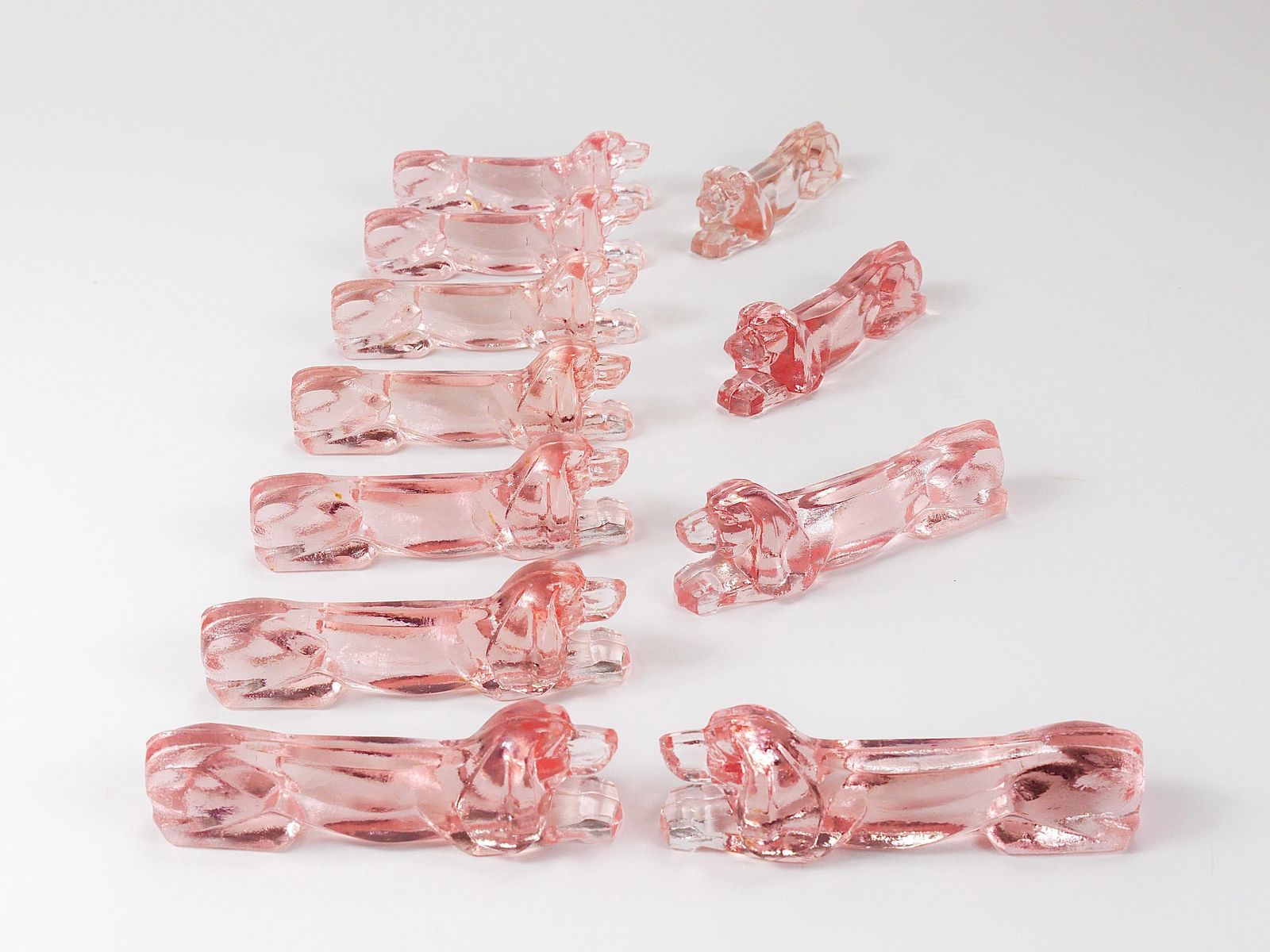 photo for sale 12 French Art Deco Dachshund Basset Hound Knife Rests, Rosé Glass, France, 1930s