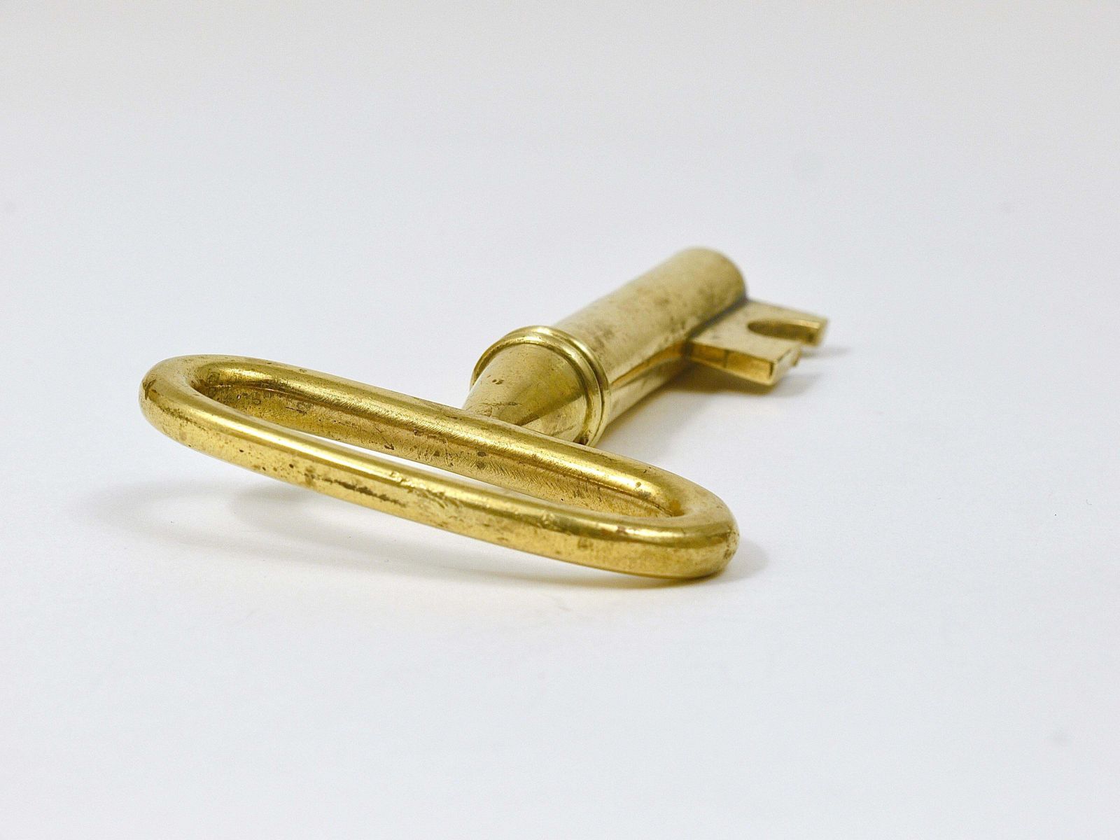 photo furniture Carl Aubock Big Brass Key Cork Screw, Bottle Opener, Paperweight, Austria, 1950s
