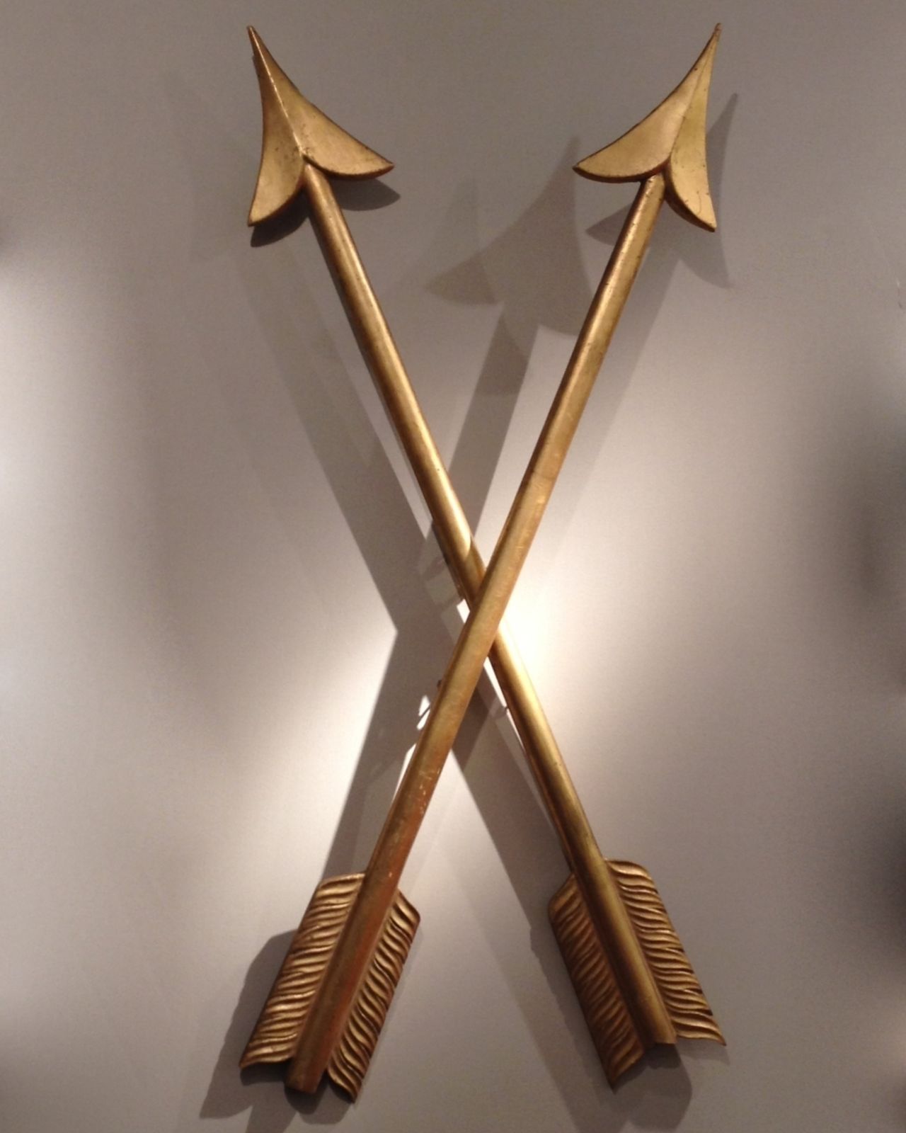 Four Gilt Wooden Arrows