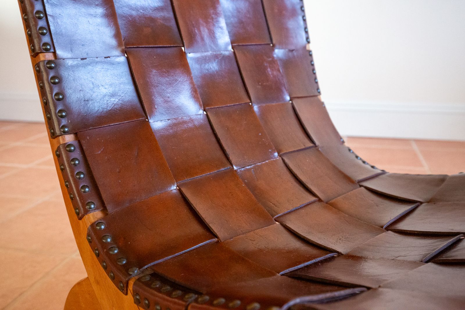 photo buy Pierre Lottier Slipper Lounge Chair Cigar Leather Strap 1960s Blonde Valenti Spanish French Mid Century Mcm Designer Neoclassical