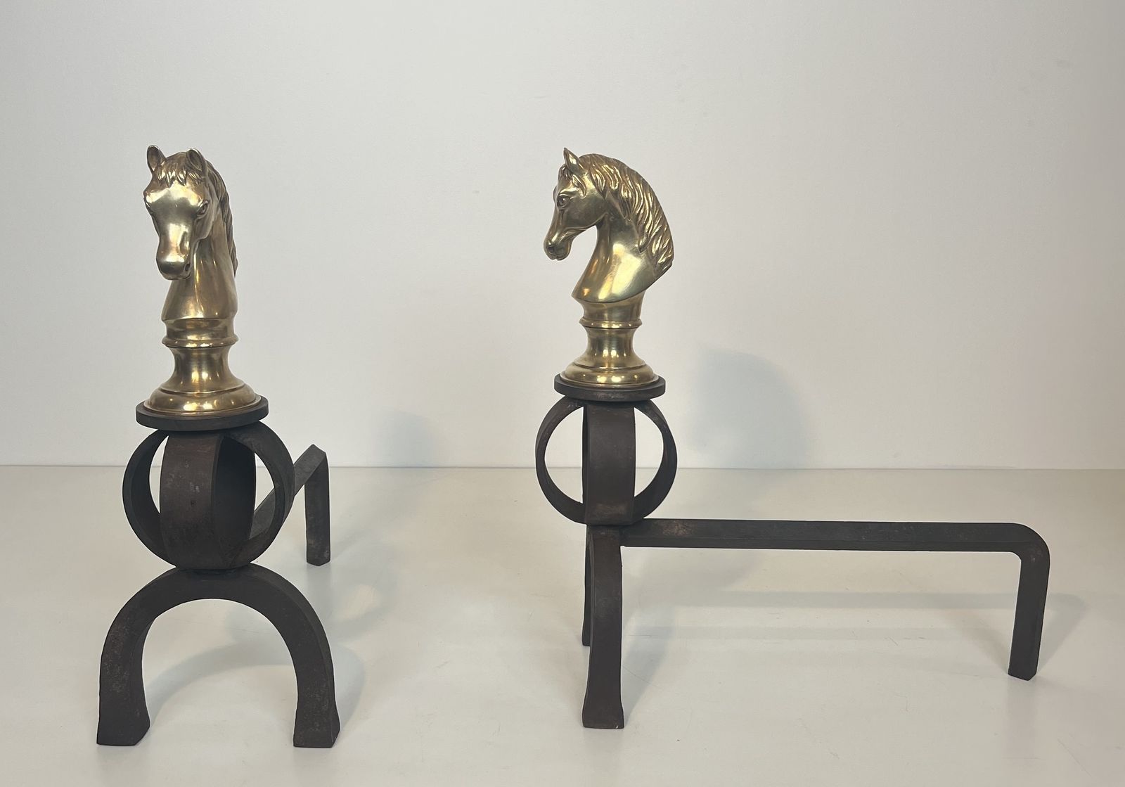 Important Pair Of Bronze And Wrought Iron Andirons Representing Horses' Heads photo furniture