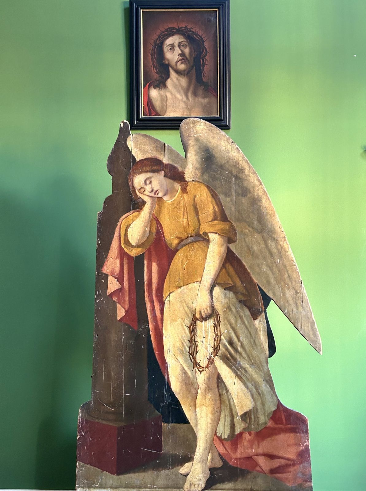 19th Century Life Size Oil Painting On Carved Wooden Panel Of A Mourning Angel & Crown Of Thorns photo for sale