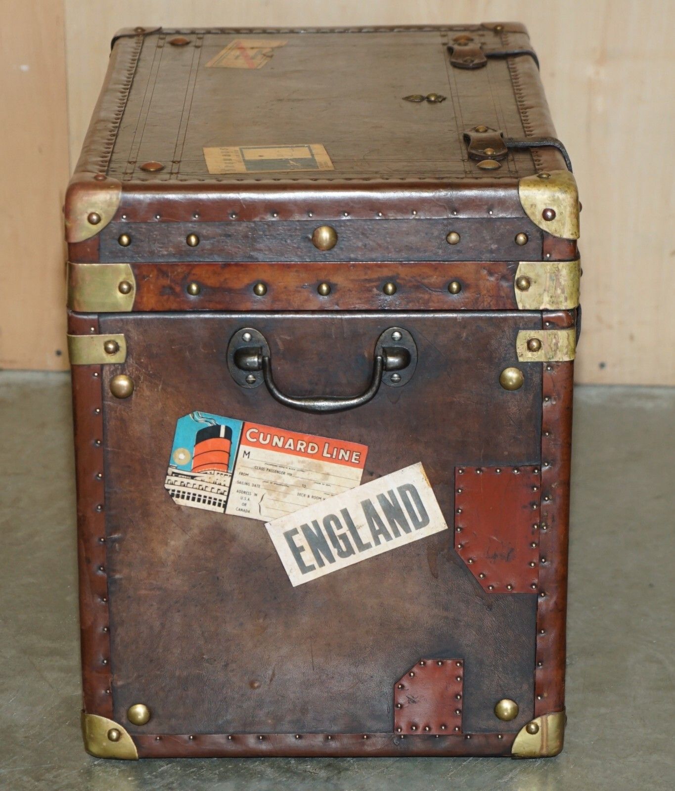 Pair Of Armorial Coat Of Arms Vintage Brown Leather Steamer Trunk Side Tables photo buy