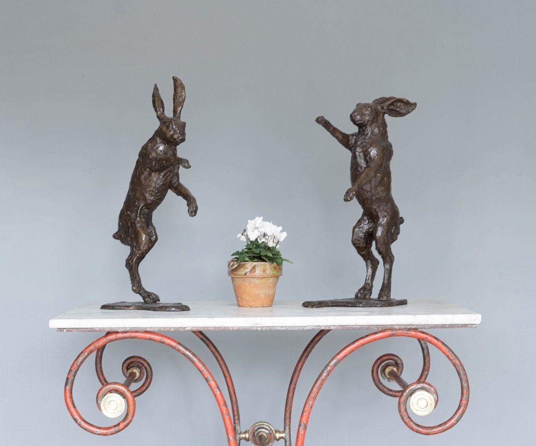 Pair Of Sculptured Boxing Hares In Bronze
