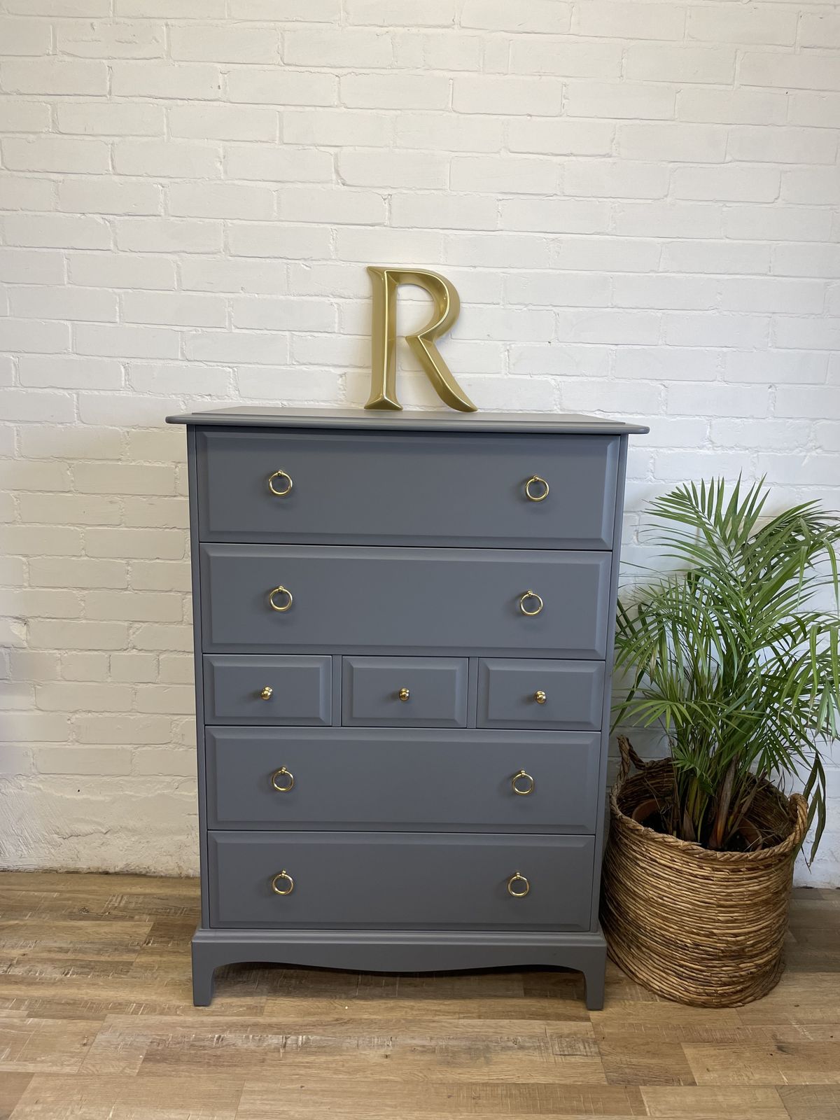 photo furniture Stag Minstrel Tallboy And Pair Of Narrow Bedsides Painted Grey