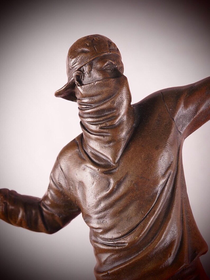 Bronze Banksy Flower Thrower Sculpture: Contemporary Street Art Masterpiece For Modern Home Decor photo for sale