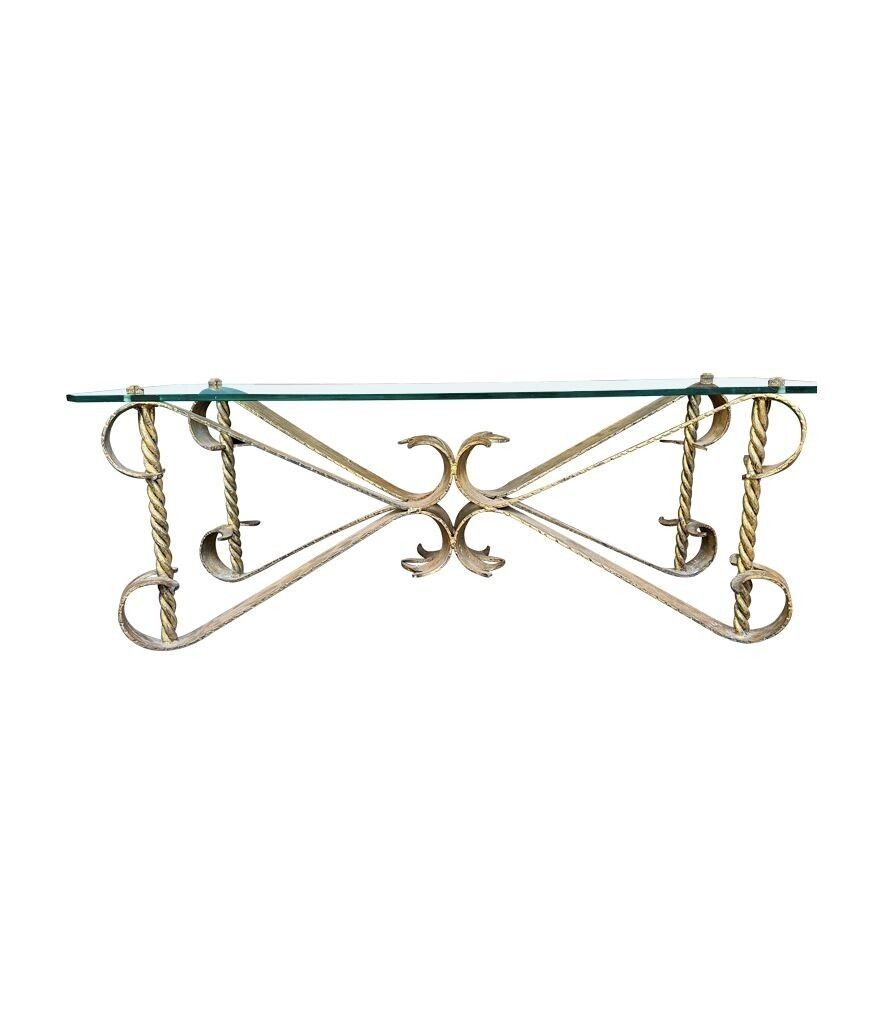 A Spanish 1950s Gilt Wrought Iron Coffee Table With Thick Glass Top photo vinterior