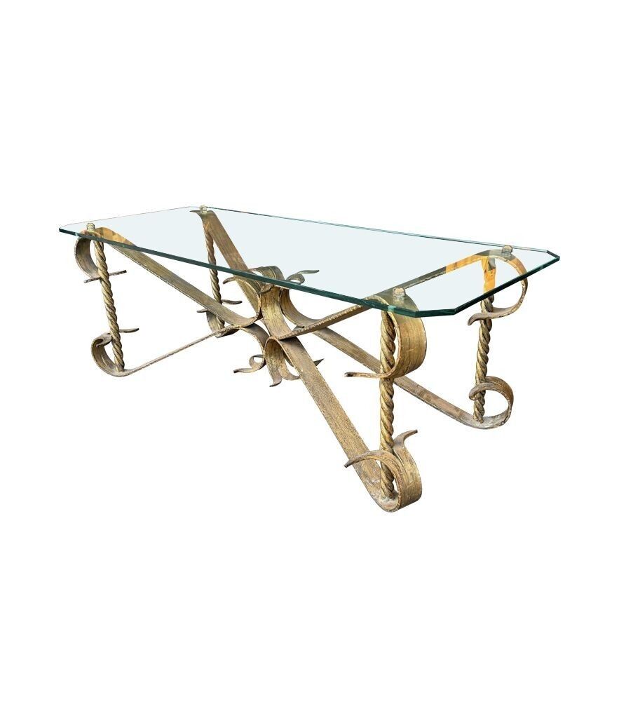 Furniture A Spanish 1950s Gilt Wrought Iron Coffee Table With Thick Glass Top photo
