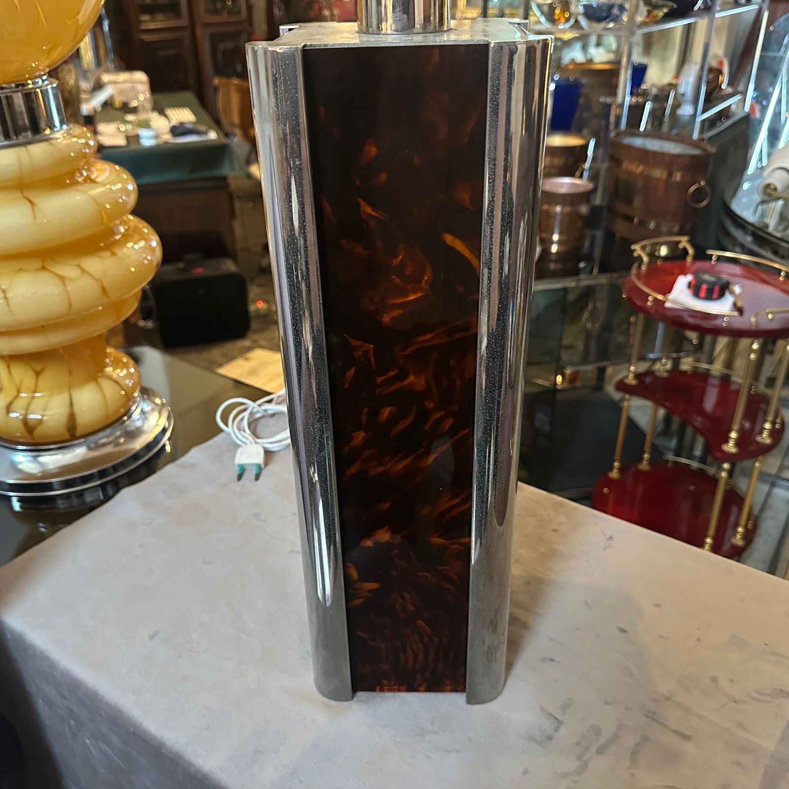 1375.0 1970s Mid Century Modern Fake Tortoiseshell Lucite And Silver Plate Table Lamp photo