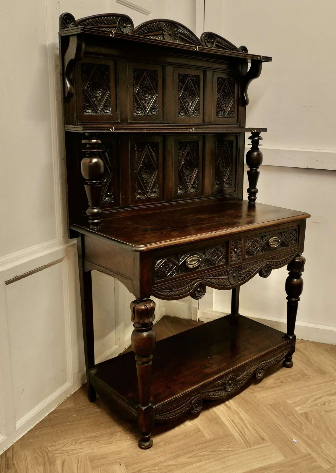 18th Century Carved Dresser With Geometric Carvings photo 1500.0