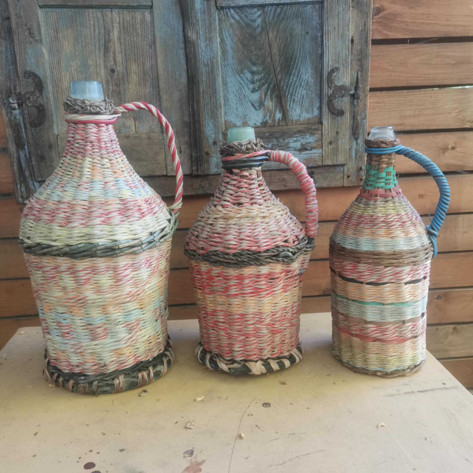 Brighten The Home Set Of 3 Weaved Wicker Bottles Colorful. Old Retro Plastic Decorated Pop Bottle Cafe Kitchen Decor Eye Catching Demijohn photo vinterior