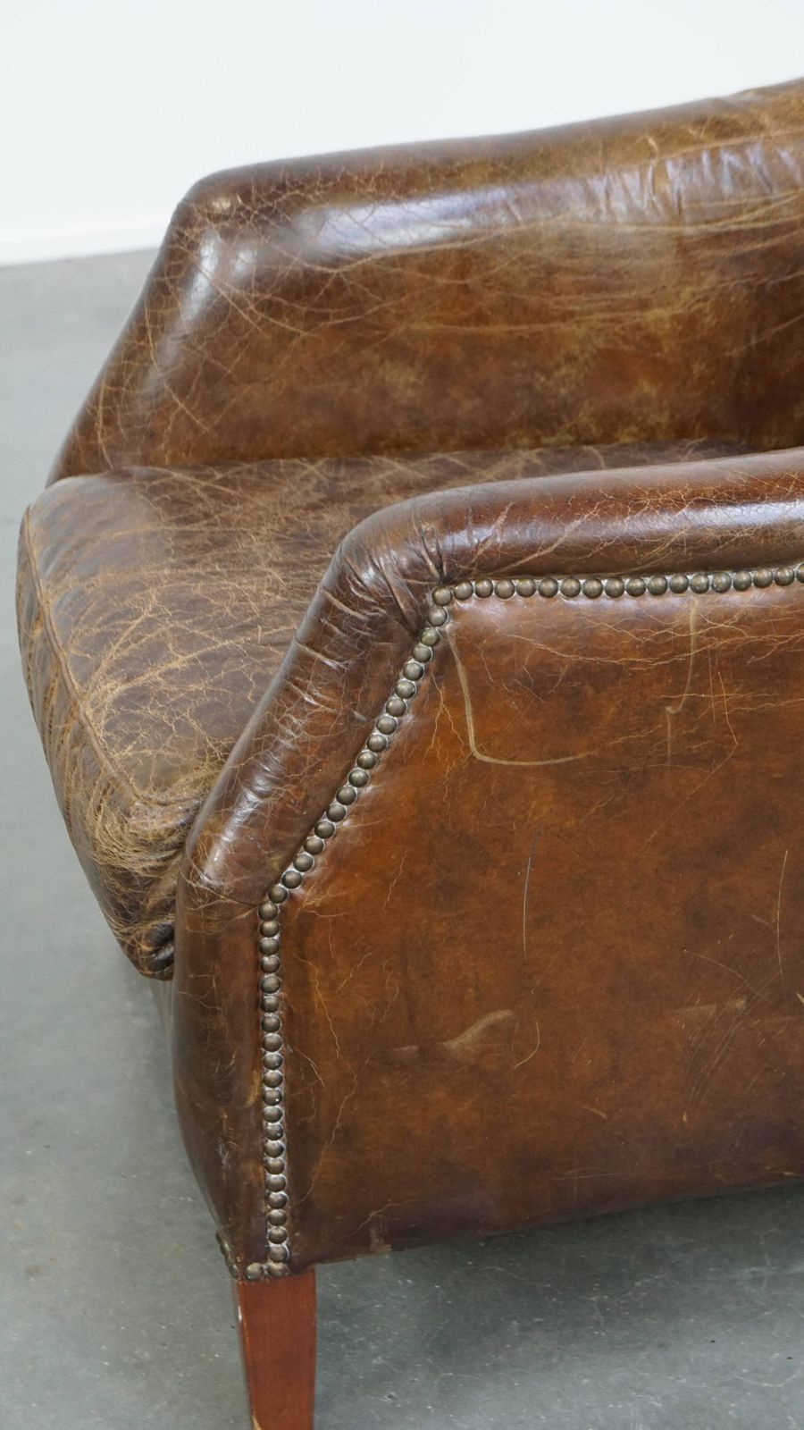photo buy Stately And Comfortable Cowhide Armchair With A Timeless Design And A Beautiful Color Scheme