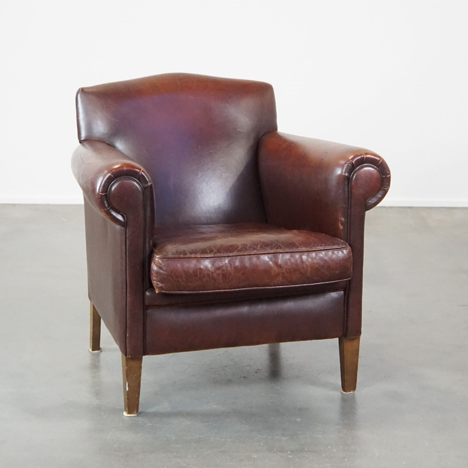Sleekly Finished Armchair Made Of Sheepskin