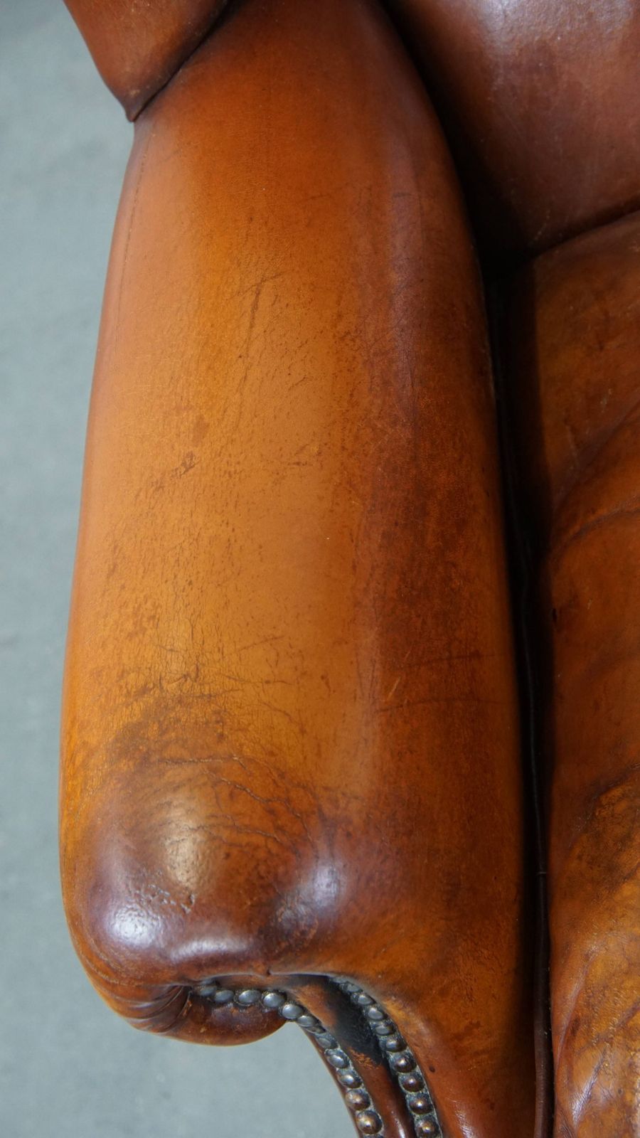 Comfortable Sheepskin Wing Chair With A Warm Color Scheme And A Beautiful Patina photo buy