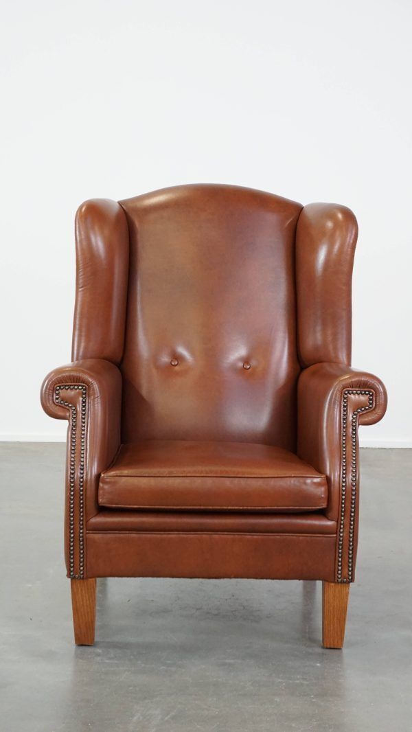 Large Cognac Colored Cowhide English Style Wing Chair In Good Condition photo furniture