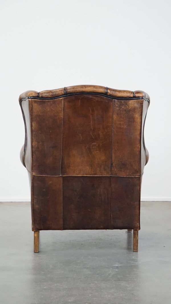 Characteristic And Comfortable Sheepskin Wing Chair With A Beautiful Patina photo Furniture