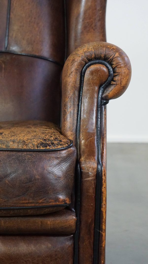 photo for sale Characteristic And Comfortable Sheepskin Wing Chair With A Beautiful Patina