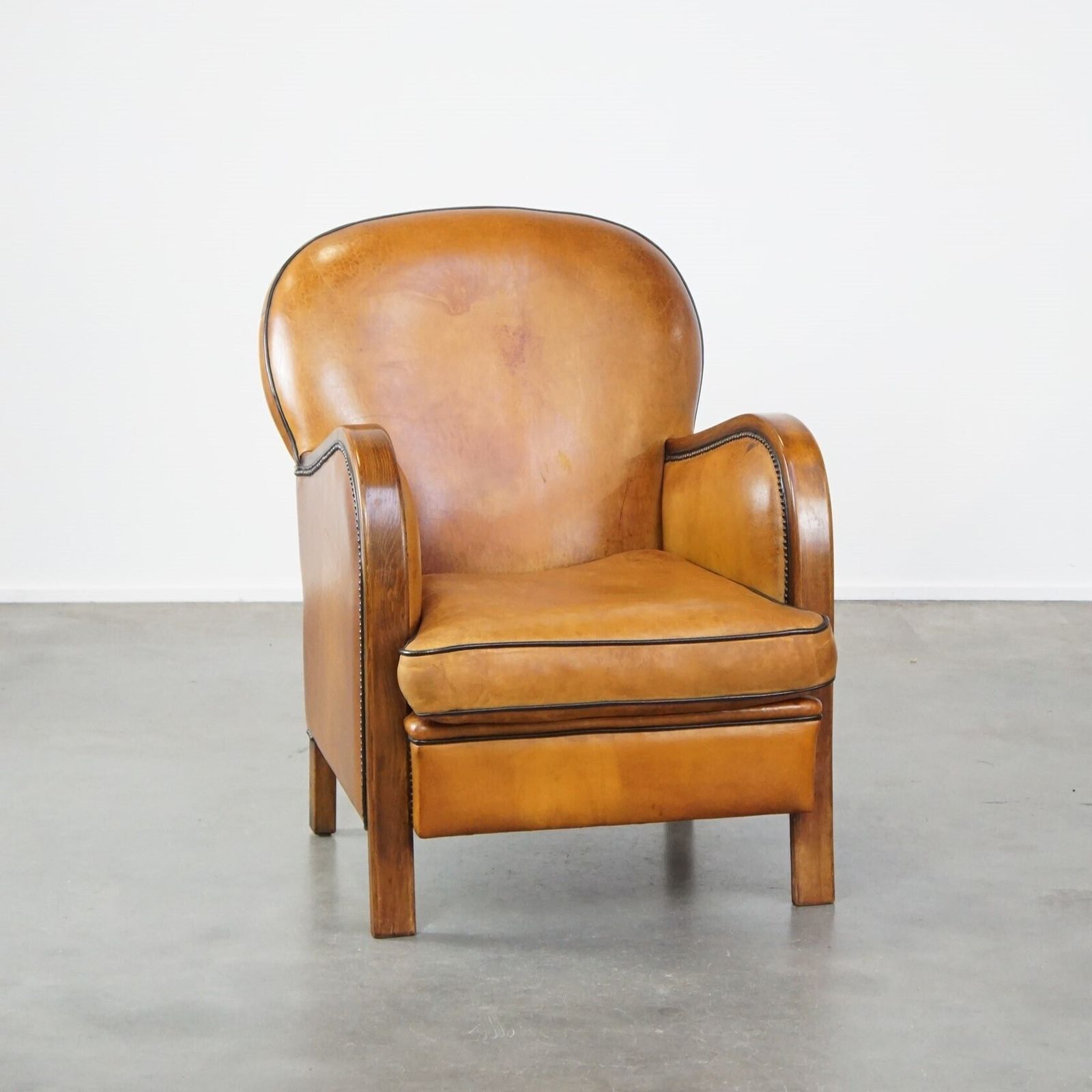 Unique, Luxurious Sheepskin Armchair Combined With Wood And Finished With Decorative Nails
