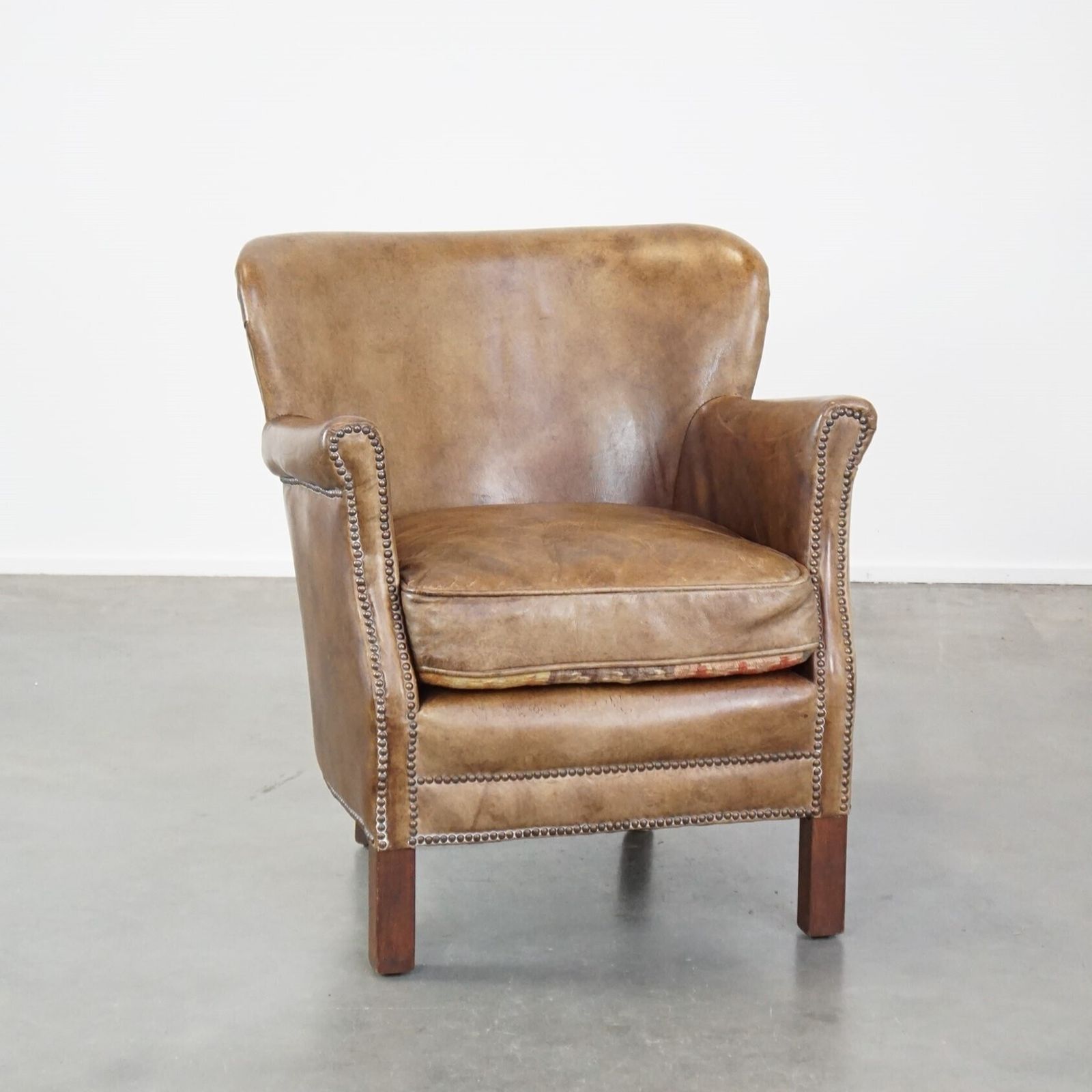 Subtle Cowhide Armchair With A Reversible Kilim Seat Cushion