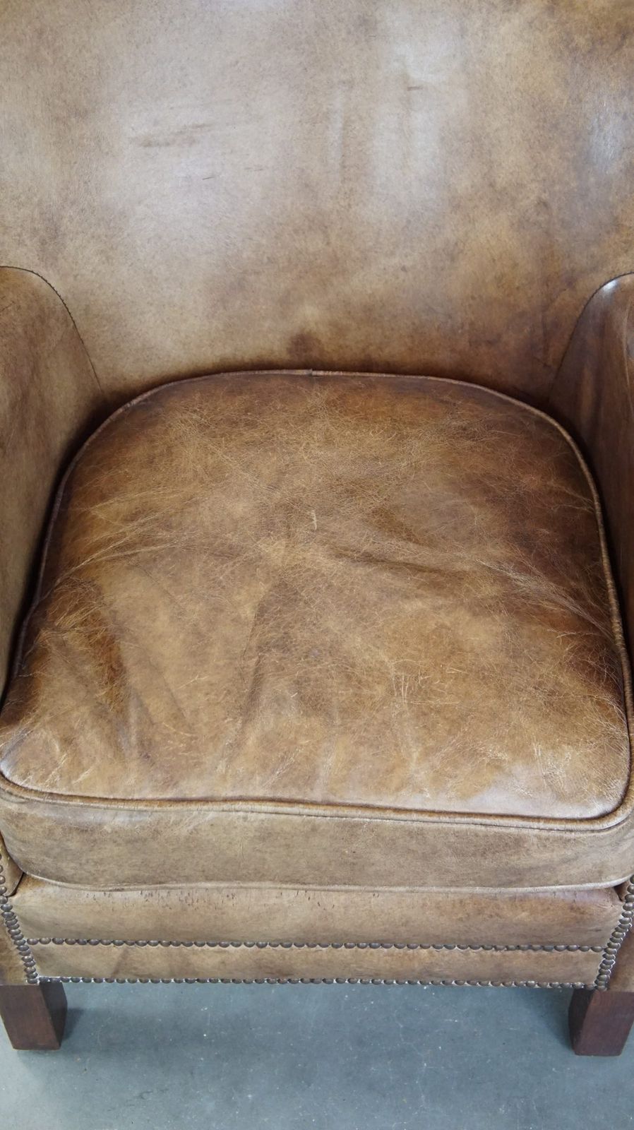 Subtle Cowhide Armchair With A Reversible Kilim Seat Cushion photo vinterior