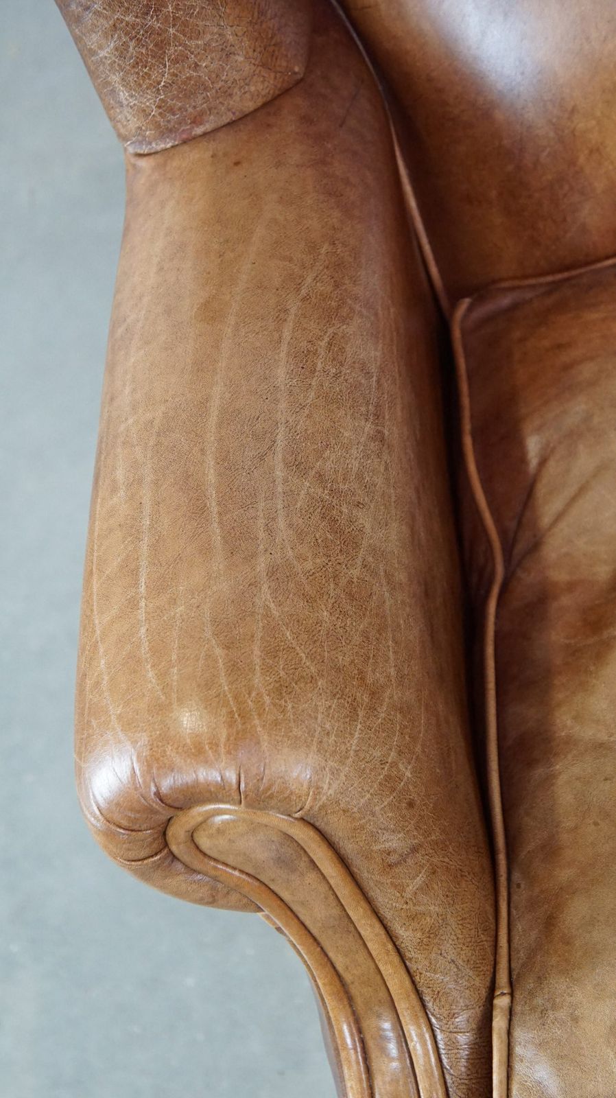 Graceful, Stylish, Timeless And Comfortable Wing Chair Made Of Cowhide In English Style photo buy