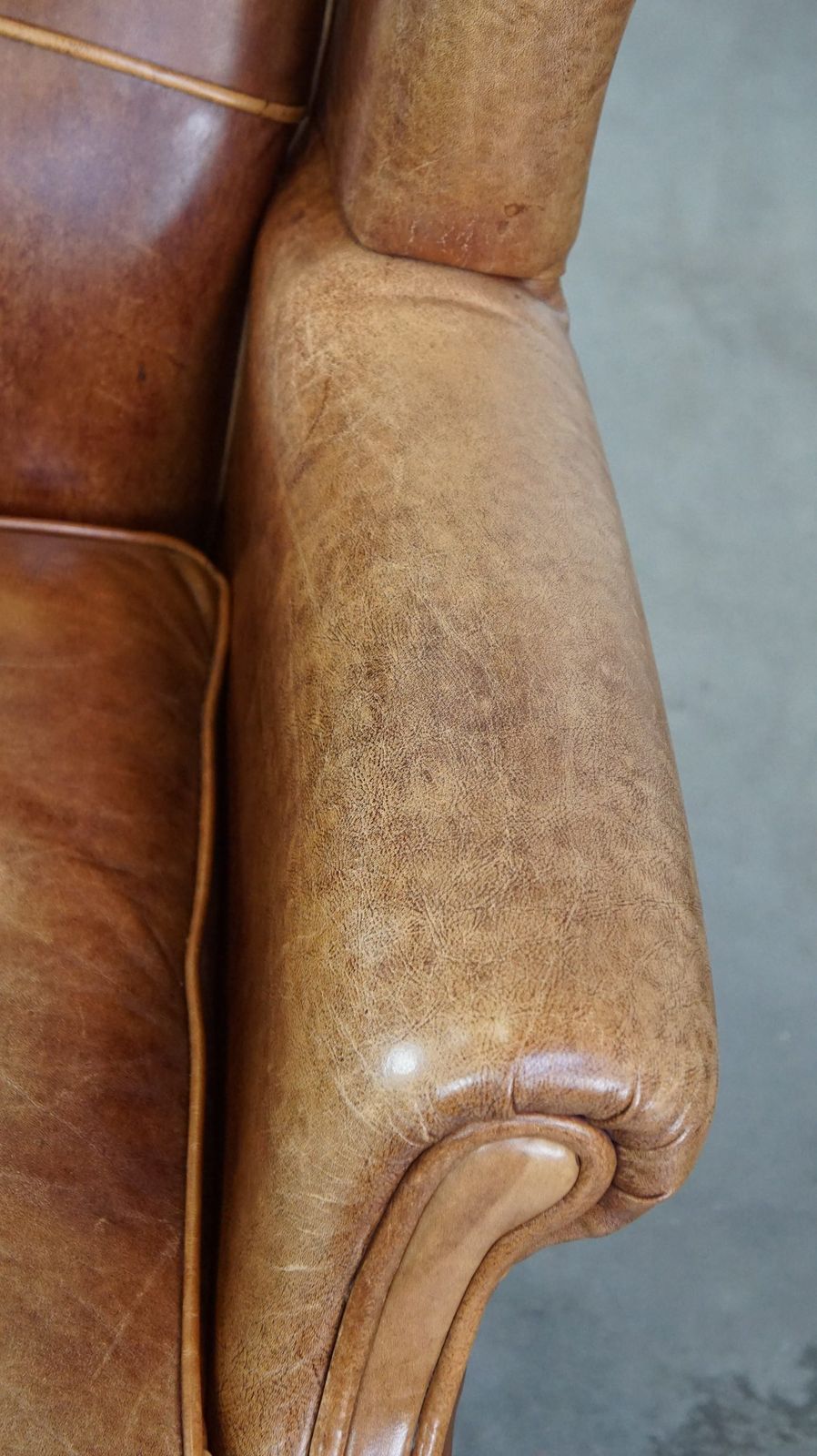 Graceful, Stylish, Timeless And Comfortable Wing Chair Made Of Cowhide In English Style photo vintage