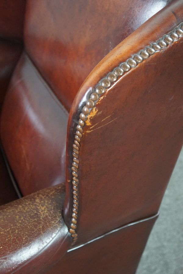 photo furniture Warm Brown Sheepskin Wing Chair With Character
