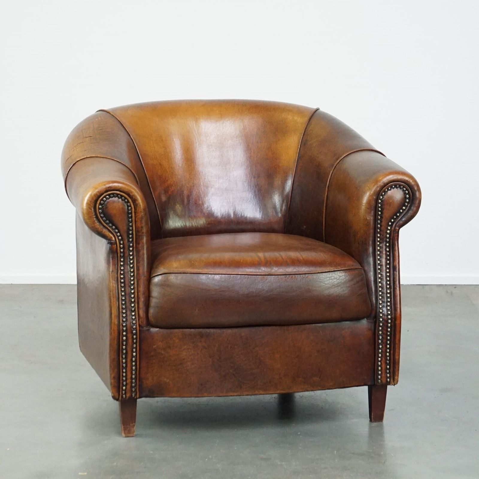 Sheepskin Club Chair With Beautiful Colours And Correct Seating Comfort