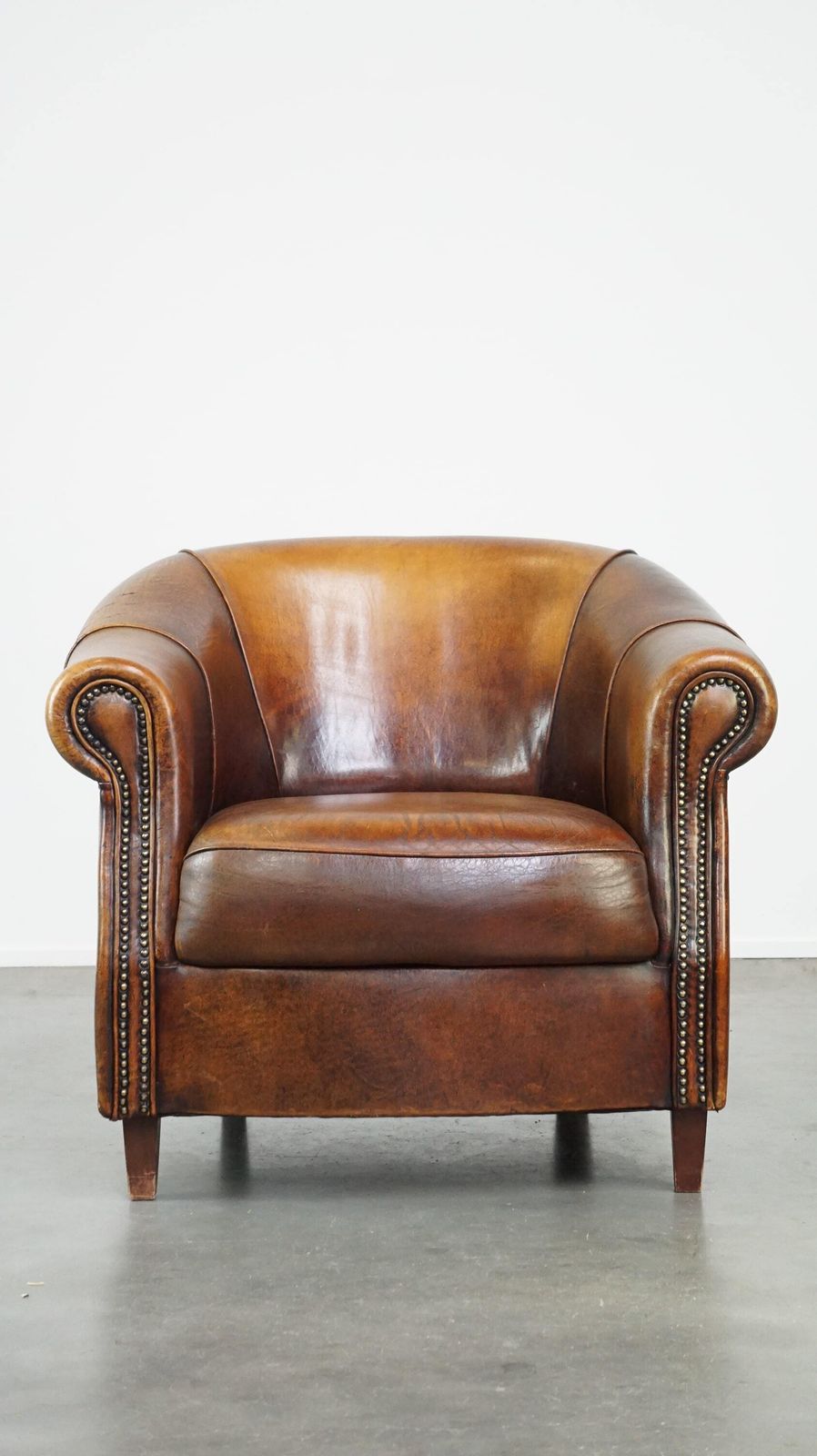 Sheepskin Club Chair With Beautiful Colours And Correct Seating Comfort photo furniture
