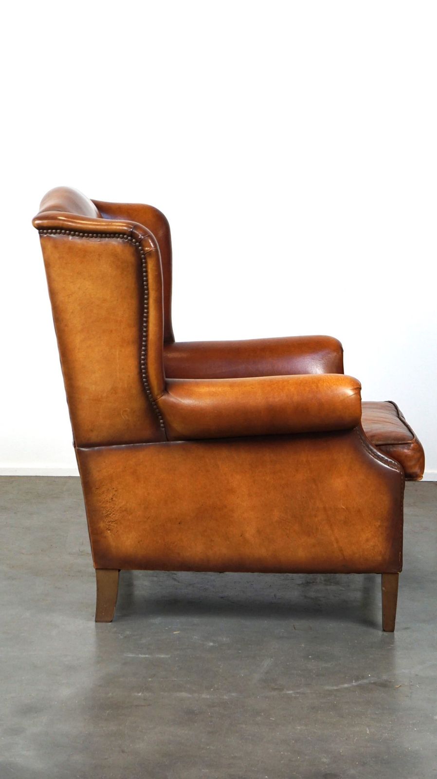 Beautiful And Comfortable Sheepskin Wing Chair With A Wonderful Patina photo for sale