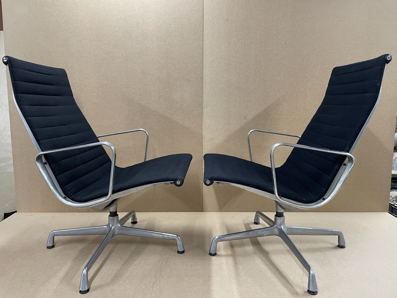 photo furniture Pair Of Eames Chairs Black Sack Cloth Ea116 Easy Lounge Chairs