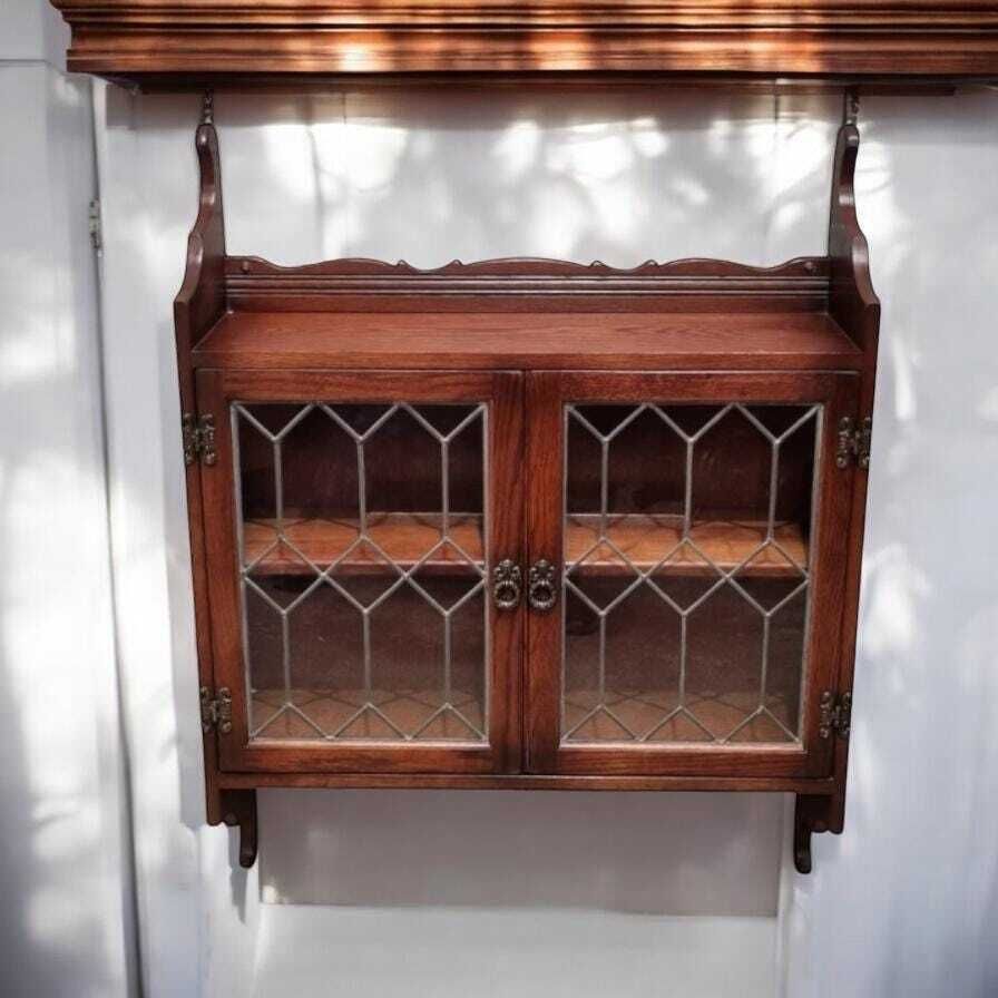 Old Charm Wood Brothers / Oak Hanging Corner Cabinet / Carved Oak Leaded Glass Door / Tudor Brown Colour / Dated 1970s