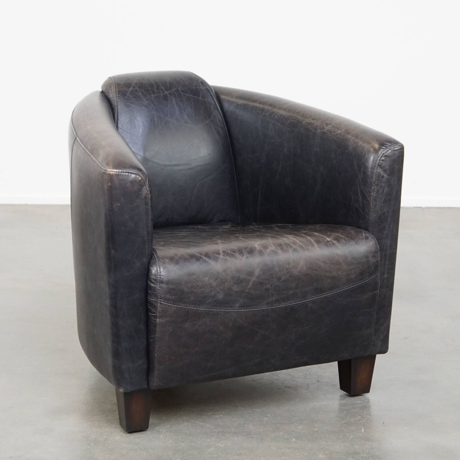 Black Cowhide Aviator Armchair With A Sleek Design And A Nice Shape