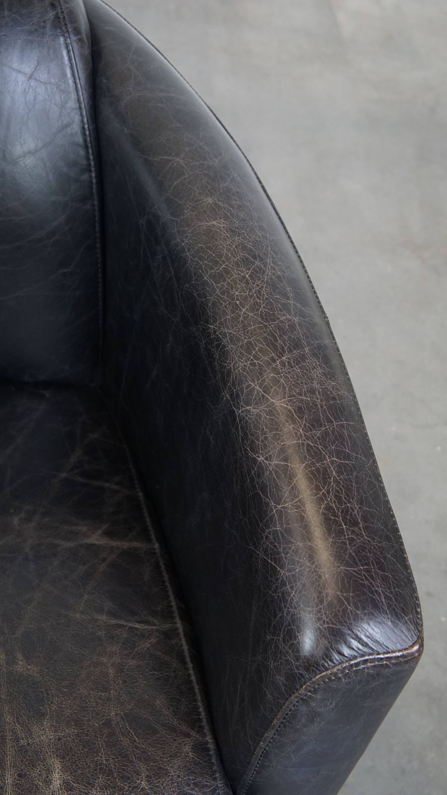 Black Cowhide Aviator Armchair With A Sleek Design And A Nice Shape photo vintage
