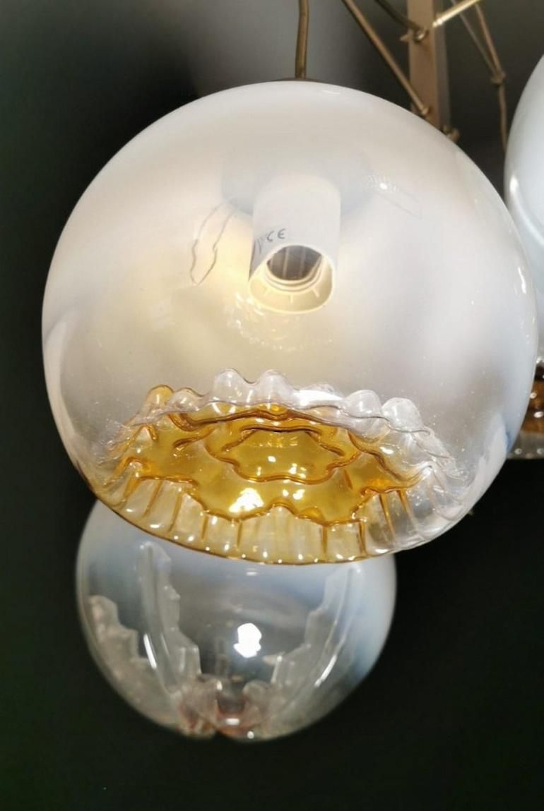 photo buy Mazzega Attributed Satin Finished Brass And Murano Glass Chandelier