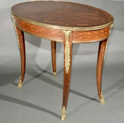 A 19th Century Gilt Bronze Mounted Louis XV Table On Hoof Feet photo furniture
