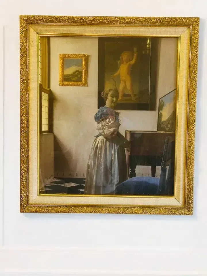Framed & Glazed "A Young Woman Standing At A Virginal" By Johannes Vermeer photo furniture