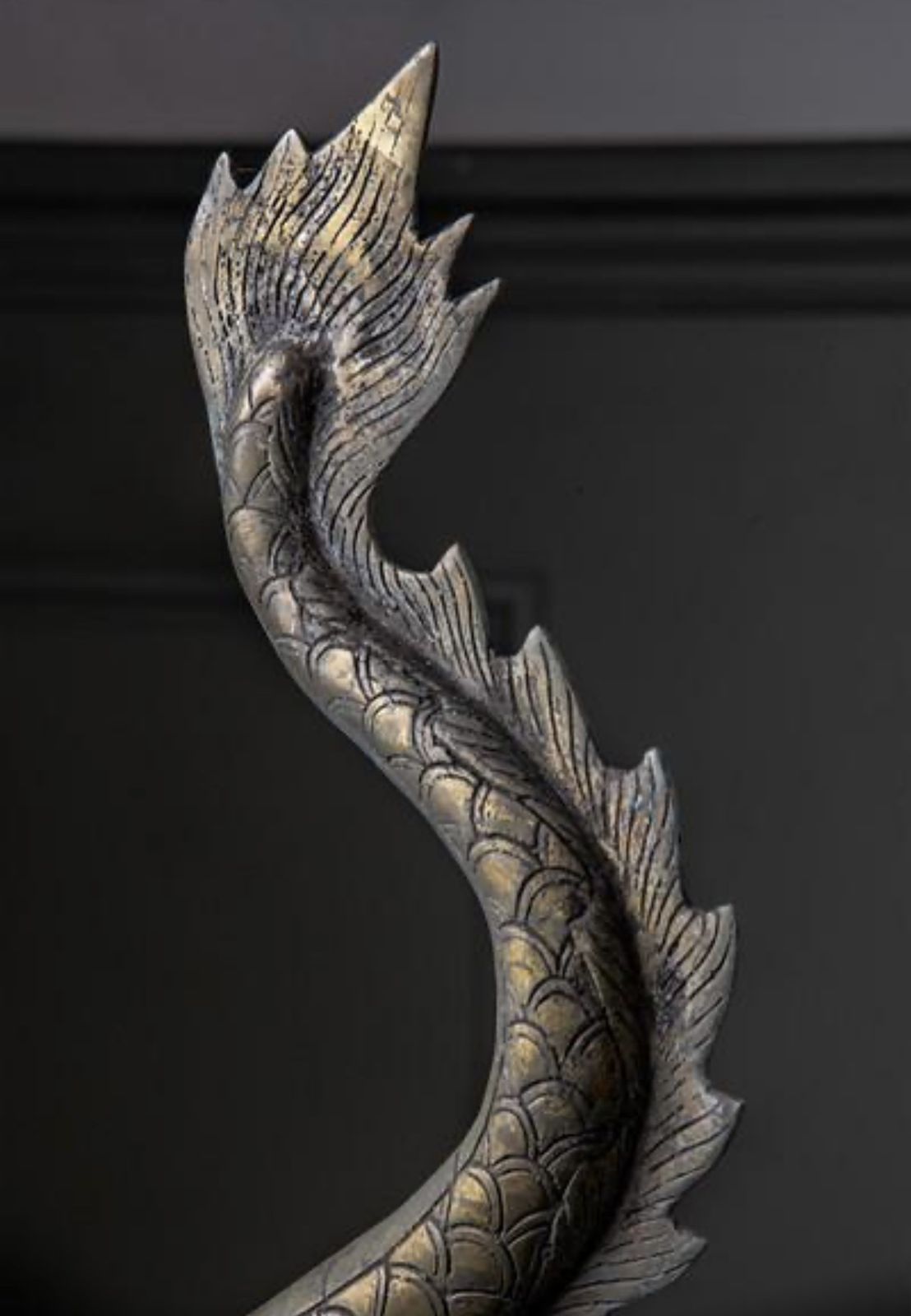 A Large Brass Dragon Chasing The Flaming Pearl Of Knowledge photo 860.0