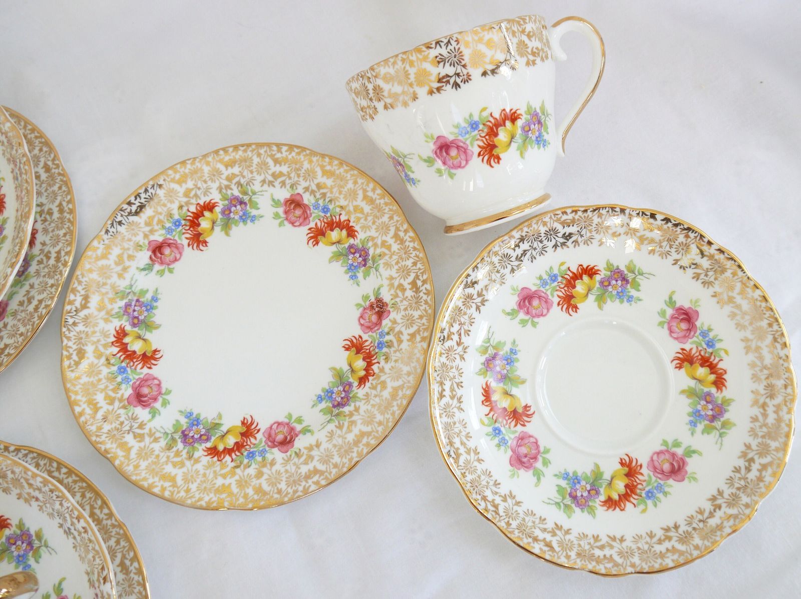Imperial Bone China Tea Cup Trios With Milk Jug And Sugar Bowl, 6 Bone China Floral And Gold Tea Cups, Saucers And Plates. photo for sale