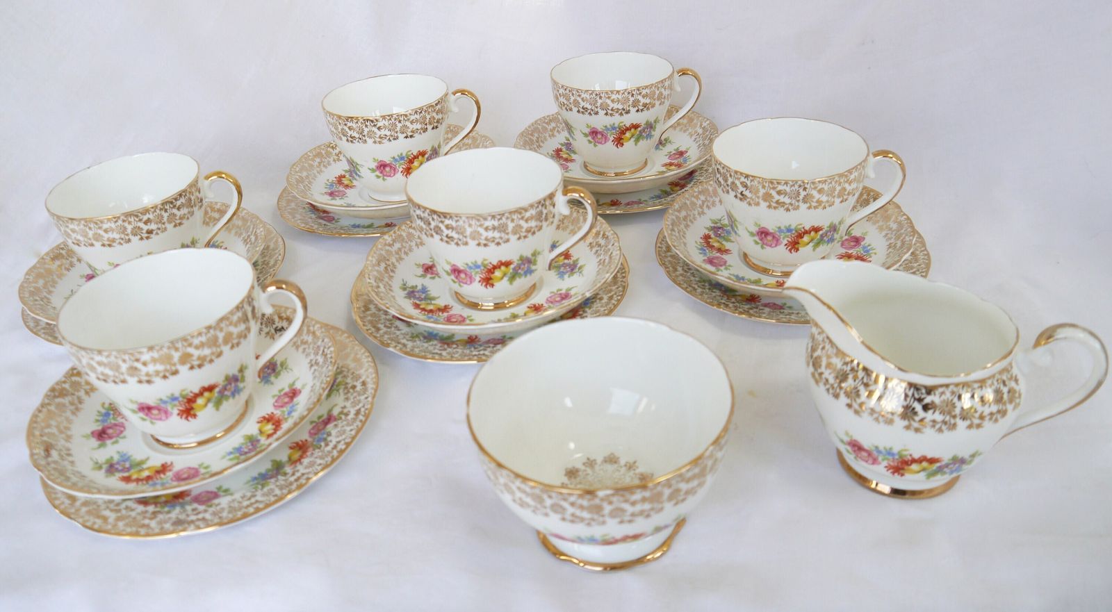 Imperial Bone China Tea Cup Trios With Milk Jug And Sugar Bowl, 6 Bone China Floral And Gold Tea Cups, Saucers And Plates. photo vinterior